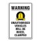 WARNING UNAUTHORISED VEHICLES WILL BE WHEEL CLAMPED SIGN
